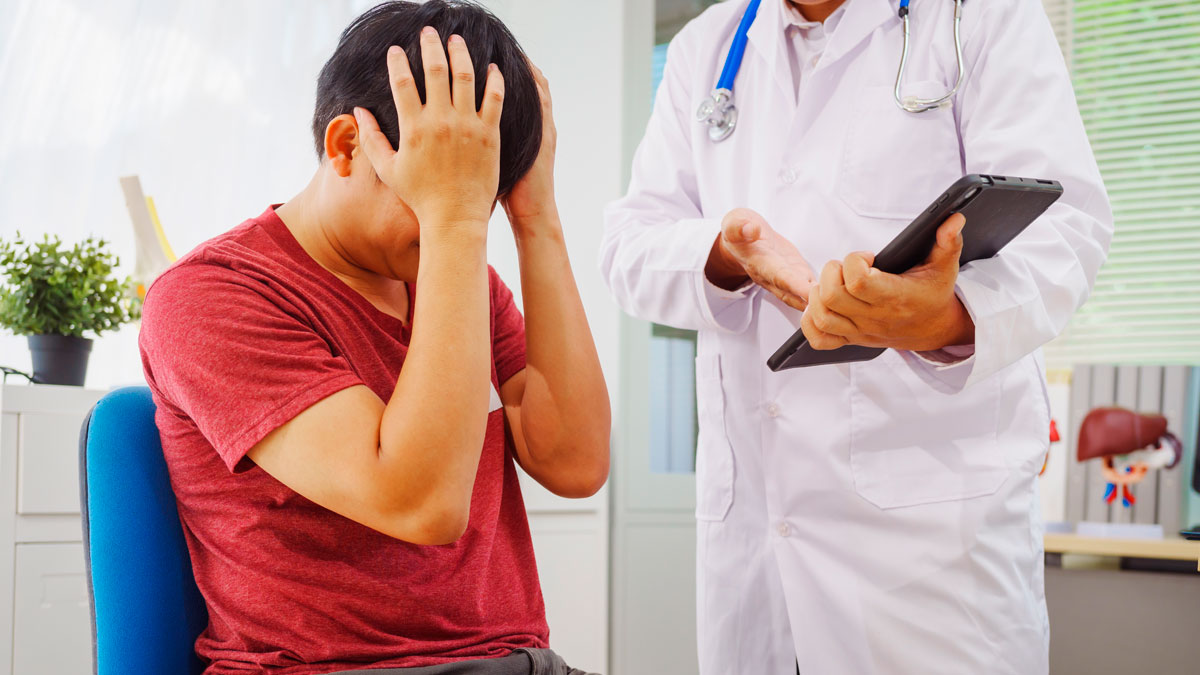 An individual experiencing recurring headaches and head discomfort
